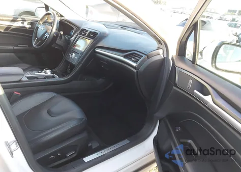 2017 Ford Fusion Energi Titanium from USA, damaged, VIN 3FA6P0SU3HR380491